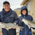 Grandpa-Grandson's successful fishing day