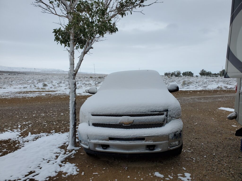 Truck covered in snow